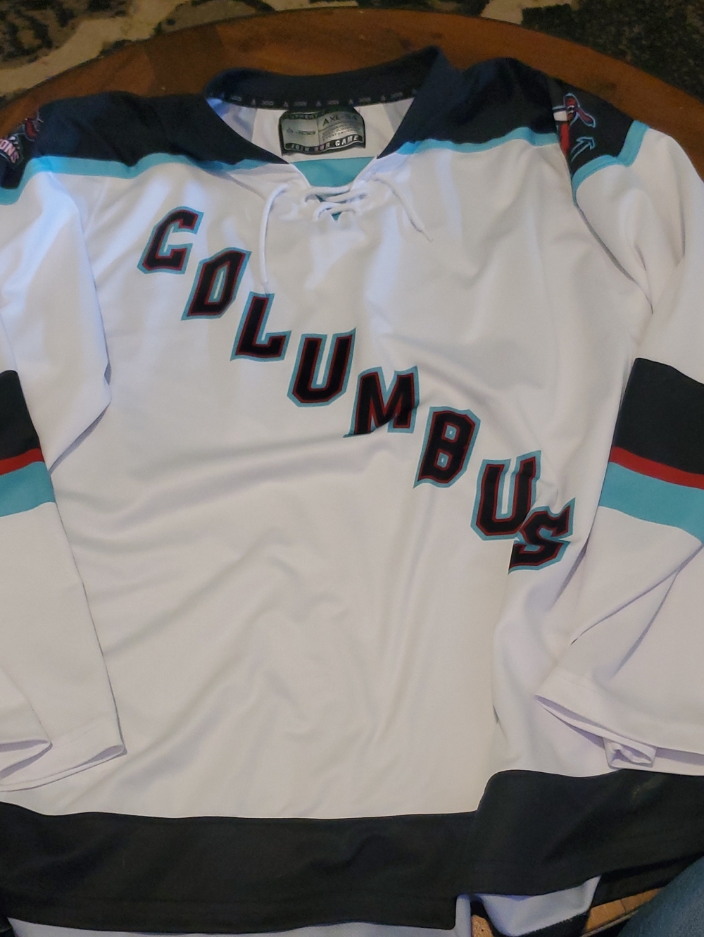 Columbus White Hockey Jersey with Teal and Black Accents